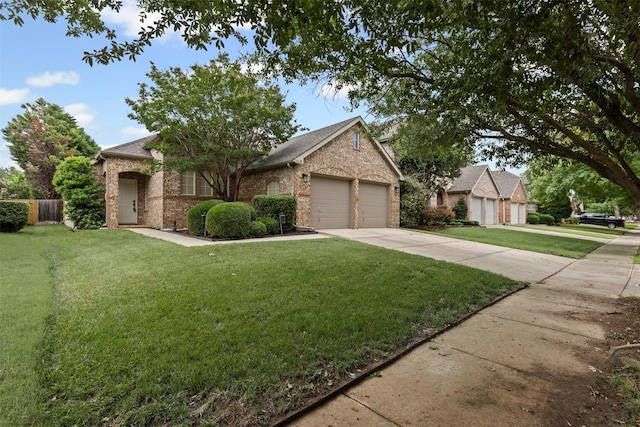 8128 Hosta Way, Fort Worth, TX 76123 - view of front facade with brick siding, driveway, and a garage