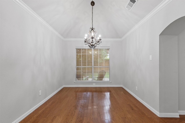 8128 Hosta Way, Fort Worth, TX 76123 - unfurnished dining area with arched walkways, wood finished floors, a chandelier, and crown molding