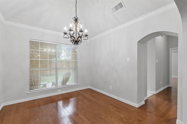 8128 Hosta Way, Fort Worth, TX 76123 - unfurnished dining area featuring arched walkways, hardwood / wood-style flooring, a chandelier, and ornamental molding