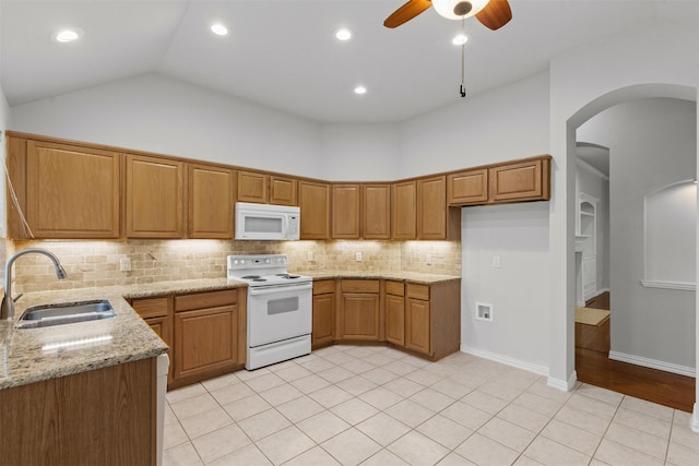 8128 Hosta Way, Fort Worth, TX 76123 - kitchen featuring white appliances, ceiling fan, tasteful backsplash, light stone counters, and light tile patterned floors