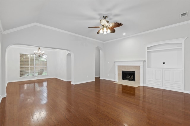 8128 Hosta Way, Fort Worth, TX 76123 - unfurnished living room featuring ceiling fan, hardwood / wood-style floors, a chandelier, a tiled fireplace, and arched walkways