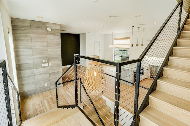 1847 Summit Ave Unit 2B, Dallas, TX 75206 - stairway with wood finished floors and recessed lighting