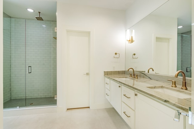 1847 Summit Ave Unit 2B, Dallas, TX 75206 - bathroom featuring a shower stall, double vanity, tile patterned flooring, and recessed lighting