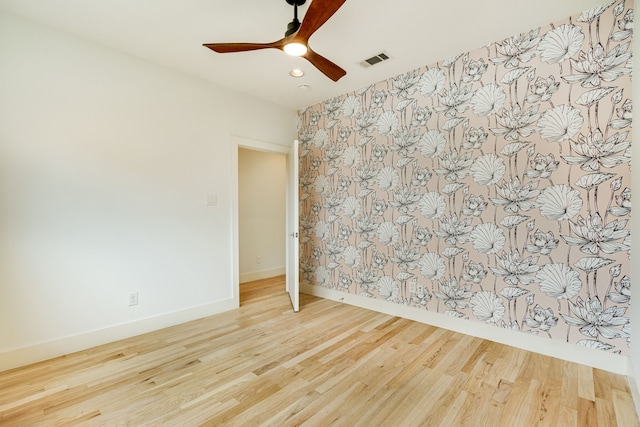 1847 Summit Ave Unit 2B, Dallas, TX 75206 - spare room featuring a ceiling fan, wood finished floors, and recessed lighting