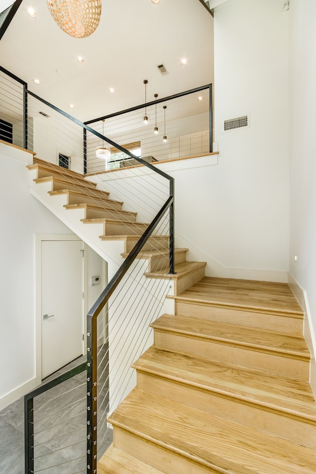 1847 Summit Ave Unit 2B, Dallas, TX 75206 - staircase featuring baseboards and recessed lighting