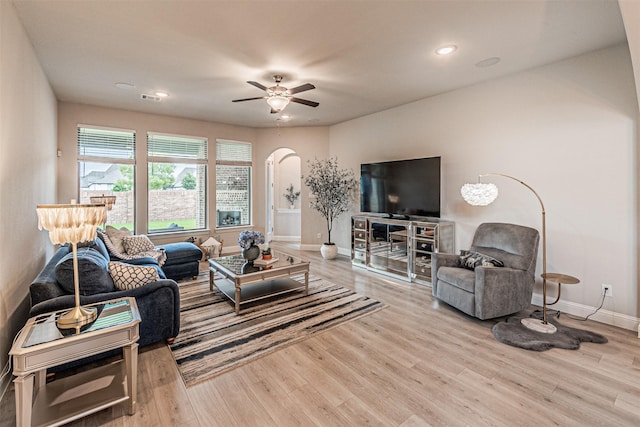 2150 Bristlegrass Rd, Frisco, TX 75033 - living room featuring arched walkways, wood finished floors, ceiling fan, and recessed lighting