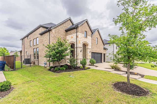 2150 Bristlegrass Rd, Frisco, TX 75033 - view of front of property featuring concrete driveway, brick siding, and stone siding