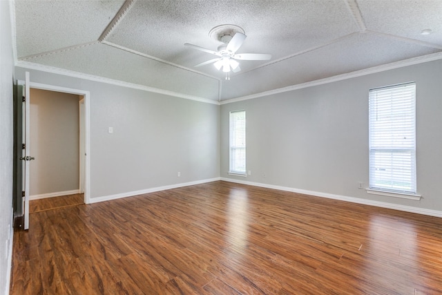 5008 Natchez Dr, Sachse, TX 75048 - unfurnished room featuring ceiling fan, wood finished floors, a textured ceiling, lofted ceiling, and ornamental molding