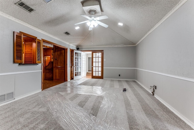 5008 Natchez Dr, Sachse, TX 75048 - carpeted empty room featuring french doors, a textured ceiling, ornamental molding, lofted ceiling, and ceiling fan