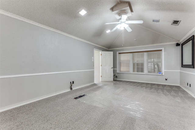 5008 Natchez Dr, Sachse, TX 75048 - spare room featuring lofted ceiling, carpet, ceiling fan, a textured ceiling, and ornamental molding