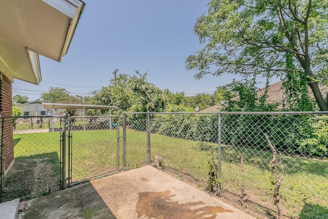 5909 Eisenhower Dr, Fort Worth, TX 76112 - view of yard with a gate