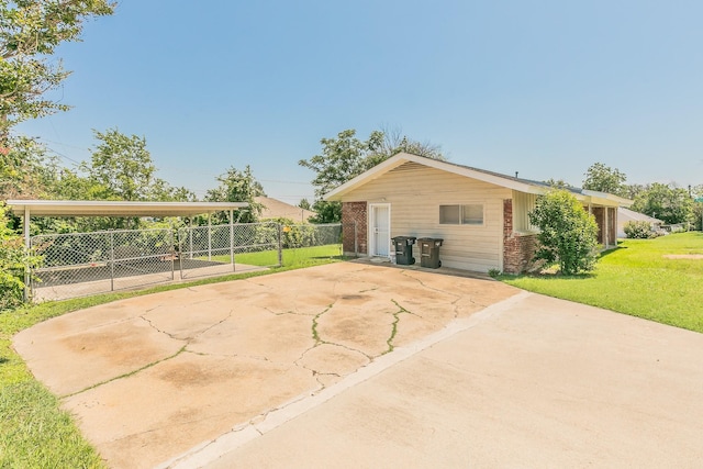 5909 Eisenhower Dr, Fort Worth, TX 76112 - view of property exterior featuring brick siding and driveway