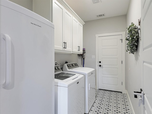 403 Sonoma Ct, Sherman, TX 75092 - laundry room featuring cabinet space, washer and dryer, and light flooring