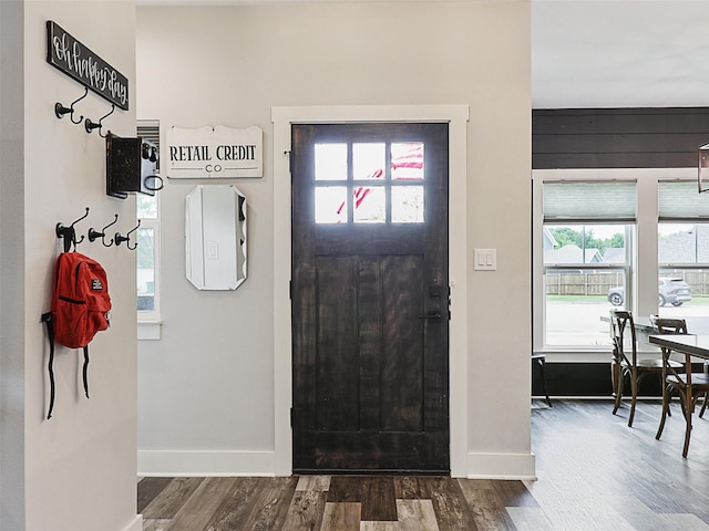 403 Sonoma Ct, Sherman, TX 75092 - foyer with healthy amount of natural light and dark wood finished floors