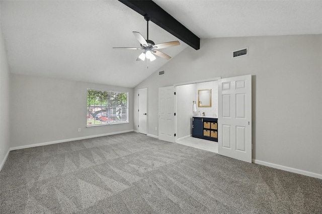 633 S Waxahachie St, Mansfield, TX 76063 - unfurnished bedroom featuring carpet flooring, beam ceiling, ceiling fan, high vaulted ceiling, and ensuite bathroom