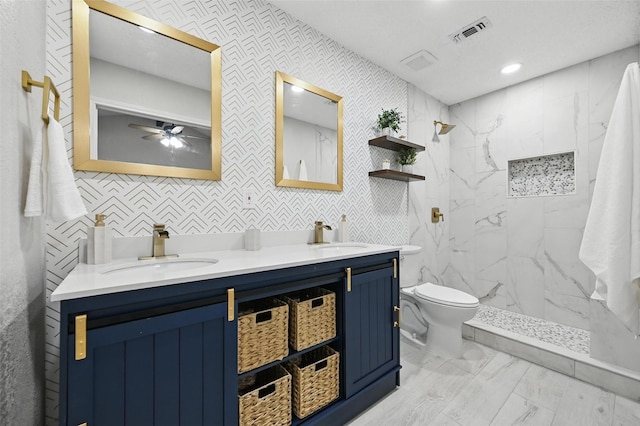 633 S Waxahachie St, Mansfield, TX 76063 - bathroom featuring marble finish floors, double vanity, a marble finish shower, recessed lighting, and a ceiling fan