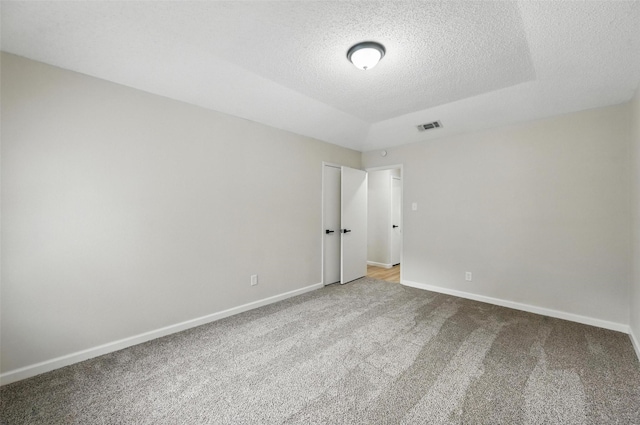 633 S Waxahachie St, Mansfield, TX 76063 - empty room featuring carpet and a textured ceiling
