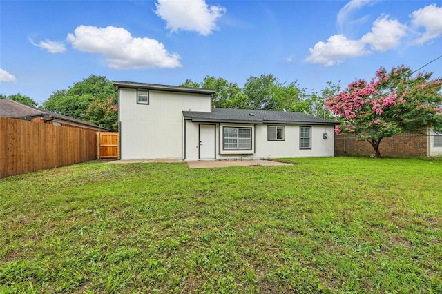 633 S Waxahachie St, Mansfield, TX 76063 - back of house featuring a fenced backyard and a patio