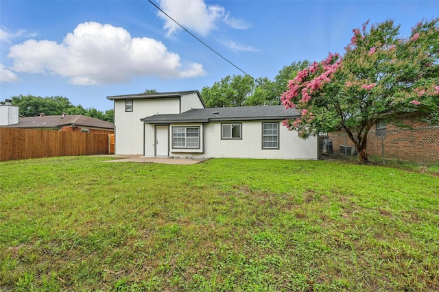 633 S Waxahachie St, Mansfield, TX 76063 - back of house featuring a patio area and a fenced backyard