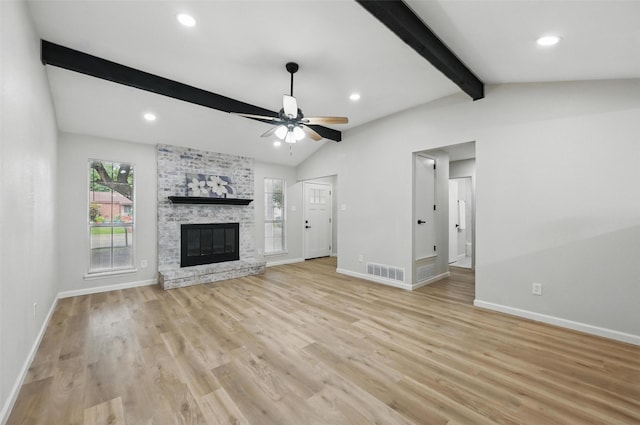 633 S Waxahachie St, Mansfield, TX 76063 - unfurnished living room with ceiling fan, a fireplace, light wood-type flooring, and recessed lighting