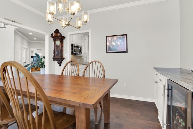 2104 Turtlecreek, Denison, TX 75020 - dining room with wine cooler, dark wood-type flooring, ornamental molding, a chandelier, and recessed lighting