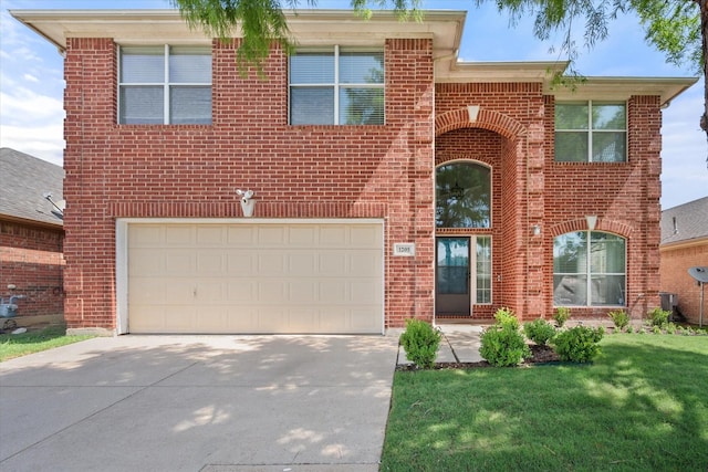 1205 Bonnet Dr, Fort Worth, TX 76131 - view of front facade featuring driveway, brick siding, an attached garage, and a front yard