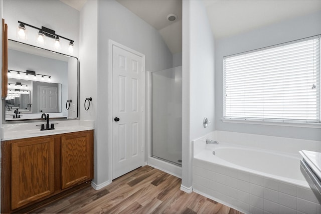 1205 Bonnet Dr, Fort Worth, TX 76131 - bathroom featuring a garden tub, vanity, wood finished floors, and a shower stall