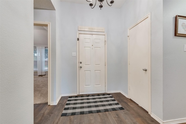 104 Singleton Dr, Royse City, TX 75189 - entrance foyer featuring dark wood finished floors and a chandelier