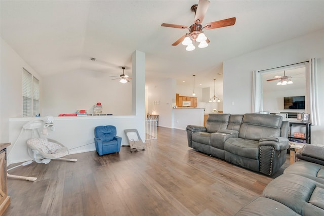104 Singleton Dr, Royse City, TX 75189 - living area with a ceiling fan, wood finished floors, and vaulted ceiling