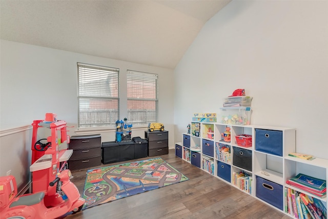 104 Singleton Dr, Royse City, TX 75189 - rec room with vaulted ceiling and wood finished floors