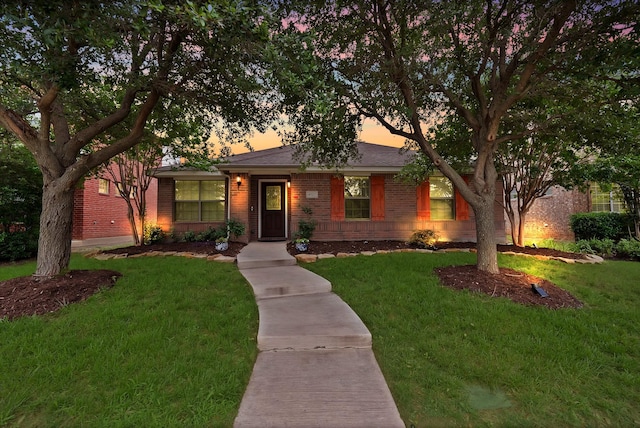 4517 Evanshire Way, Mckinney, TX 75070 - ranch-style home with brick siding and a yard