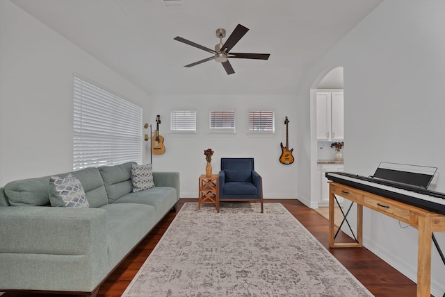 4517 Evanshire Way, Mckinney, TX 75070 - living area with ceiling fan, dark wood-style floors, and arched walkways