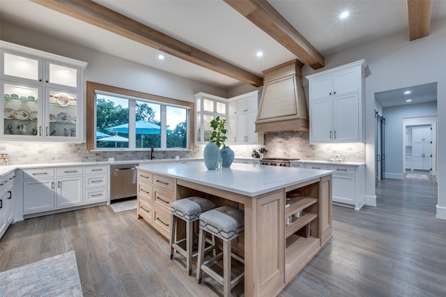 2110 Honey Ln, Celina, TX 75009 - kitchen with dishwasher, custom range hood, a kitchen island, tasteful backsplash, and beam ceiling