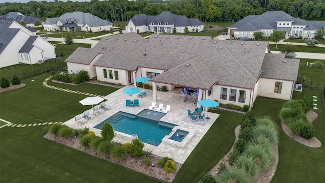 2110 Honey Ln, Celina, TX 75009 - view of pool featuring a fenced backyard, a patio area, a pool with connected hot tub, and a residential view