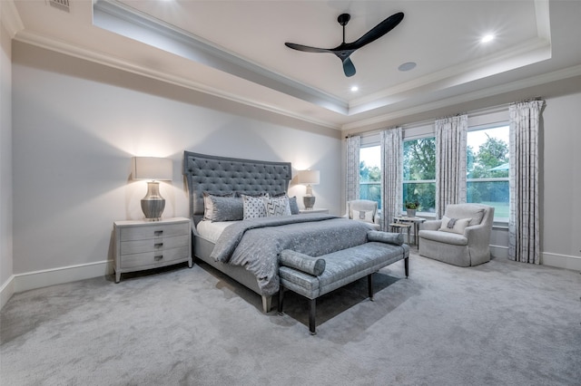 2110 Honey Ln, Celina, TX 75009 - carpeted bedroom with a tray ceiling, ornamental molding, a ceiling fan, and recessed lighting