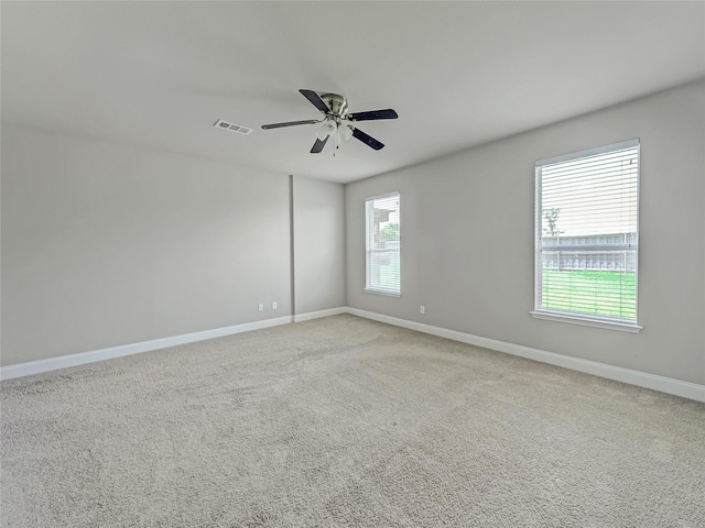 1034 Pelican Dr, Frisco, TX 75033 - spare room featuring a ceiling fan and light colored carpet