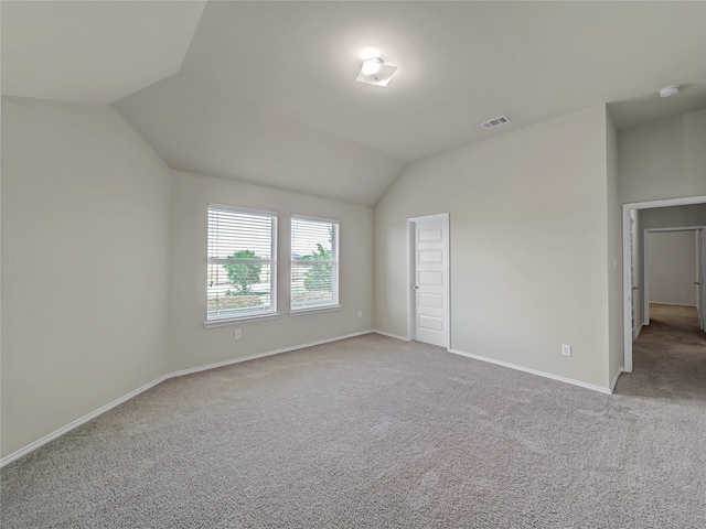 1034 Pelican Dr, Frisco, TX 75033 - unfurnished bedroom with vaulted ceiling and light carpet