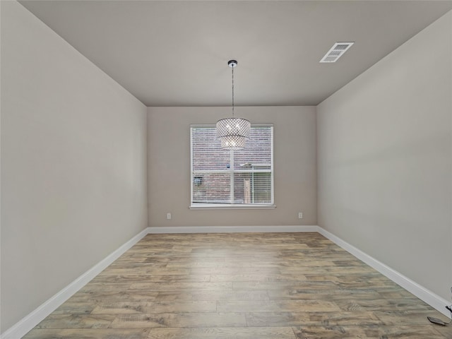 1034 Pelican Dr, Frisco, TX 75033 - unfurnished room featuring wood finished floors and baseboards