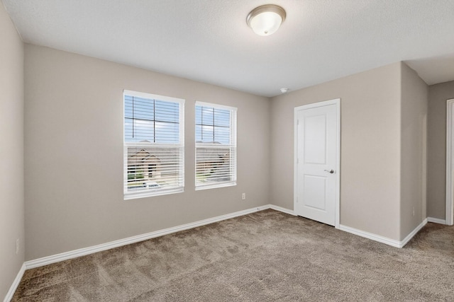 333 Edmund Ln, Fate, TX 75087 - carpeted empty room featuring baseboards