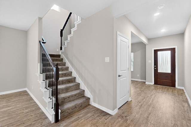 333 Edmund Ln, Fate, TX 75087 - entryway featuring stairs, wood finished floors, and recessed lighting