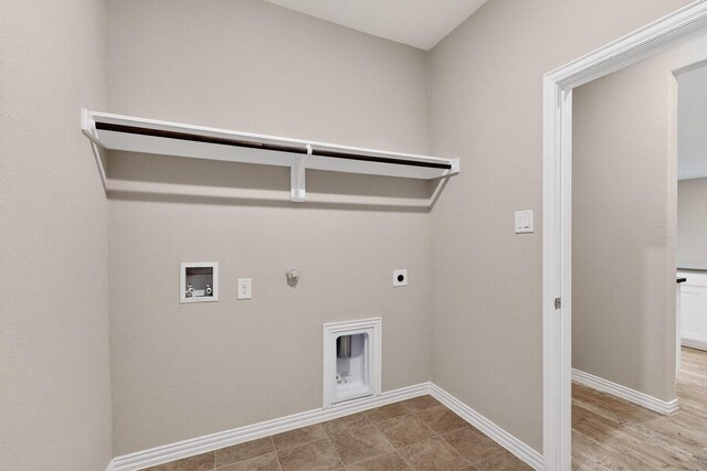333 Edmund Ln, Fate, TX 75087 - washroom featuring gas dryer hookup, electric dryer hookup, and washer hookup