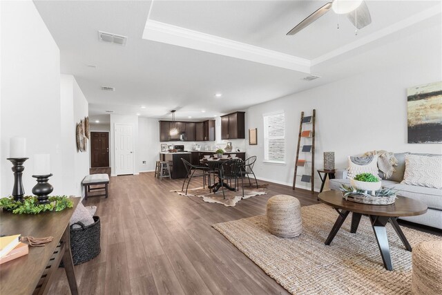 1105 Trace Dr, Aubrey, TX 76227 - living room featuring a ceiling fan, wood finished floors, crown molding, and recessed lighting