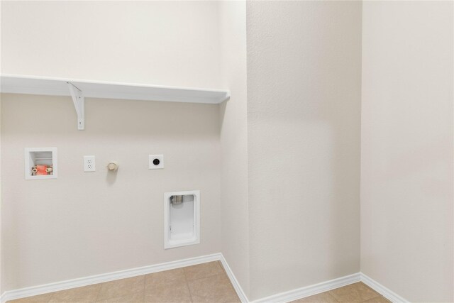 1105 Trace Dr, Aubrey, TX 76227 - laundry room with washer hookup, hookup for an electric dryer, hookup for a gas dryer, and light tile patterned flooring