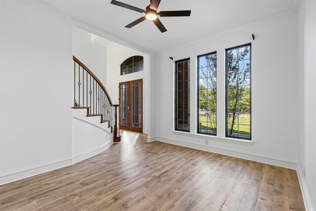 805 S Duncan Creek Ct, Weatherford, TX 76087 - foyer entrance with light wood-type flooring, a ceiling fan, stairway, and ornamental molding