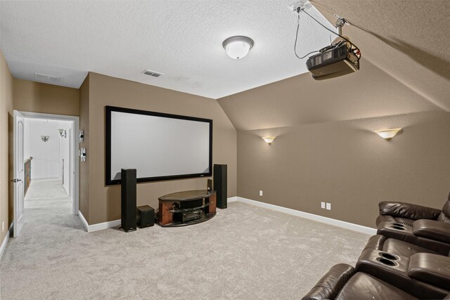 805 S Duncan Creek Ct, Weatherford, TX 76087 - cinema room featuring light carpet, a textured ceiling, and lofted ceiling