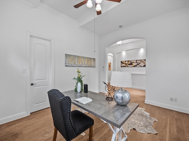 3241 Mindy Ln, Midlothian, TX 76065 - home office with arched walkways, a ceiling fan, crown molding, and wood finished floors