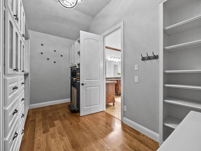 3241 Mindy Ln, Midlothian, TX 76065 - walk in closet with wood finished floors and vaulted ceiling