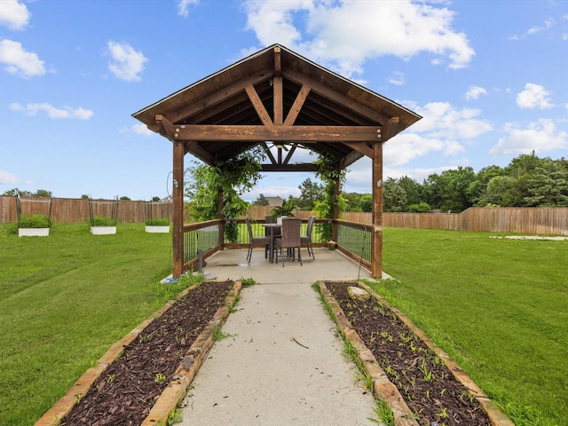 3241 Mindy Ln, Midlothian, TX 76065 - fenced backyard featuring a gazebo, a patio, and outdoor dining space