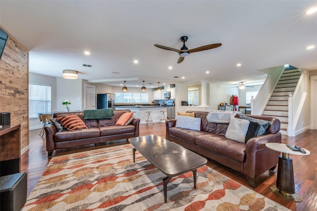 6318 White Oaks Ln, Frisco, TX 75035 - living area featuring a ceiling fan, healthy amount of natural light, wood finished floors, stairs, and recessed lighting