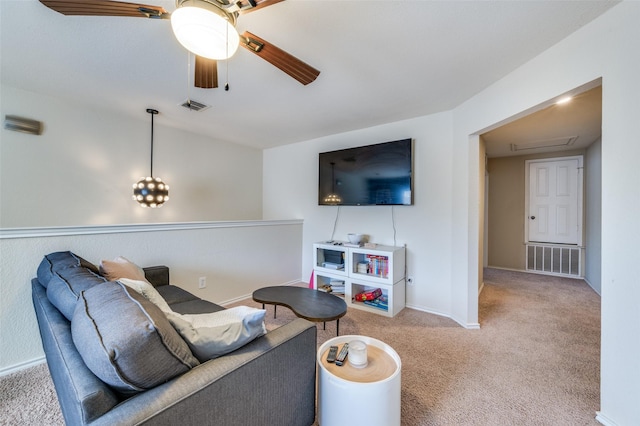 6318 White Oaks Ln, Frisco, TX 75035 - carpeted living room featuring a ceiling fan and baseboards